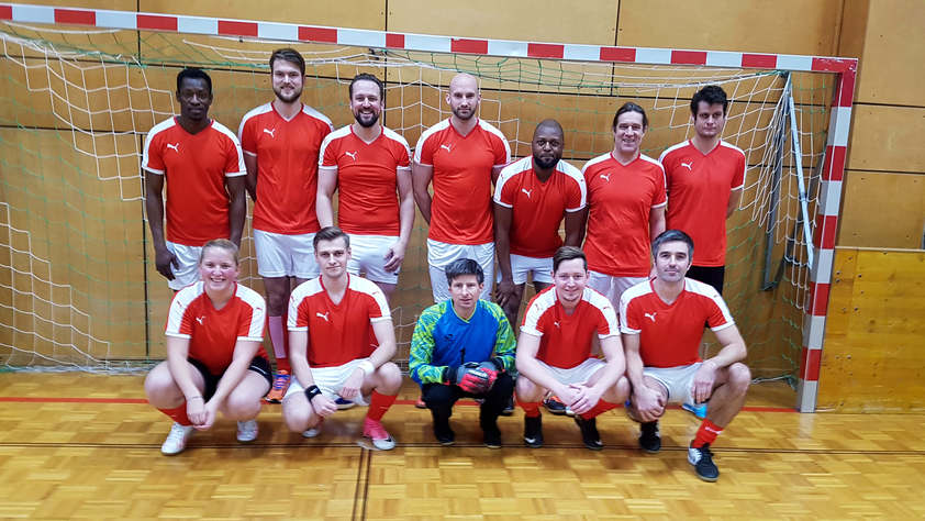 Student Chiara Feher with the FH football team at the Friends Kicking for Africa charity tournament