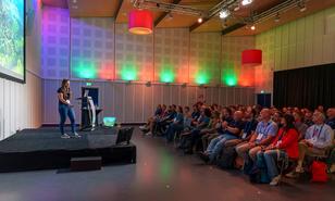 Cornelia Biacsics giving a talk